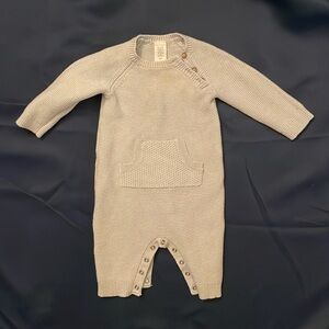 Knit romper with shoulder buttons